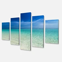 Designart - Turquoise Ocean Under Blue Sky