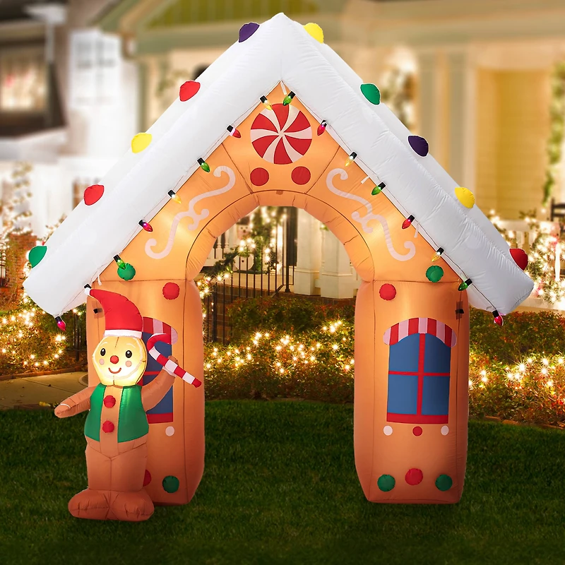Glitzhome® 8ft. LED Lighted Gingerbread House Inflatable Décor