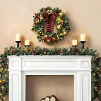 Glitzhome® 6ft. Pre-Lit Glittered Pinecones & Berries Christmas Garland, 2ct.