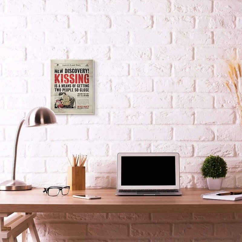 Stupell Industries Kissing Newspaper Wall Plaque