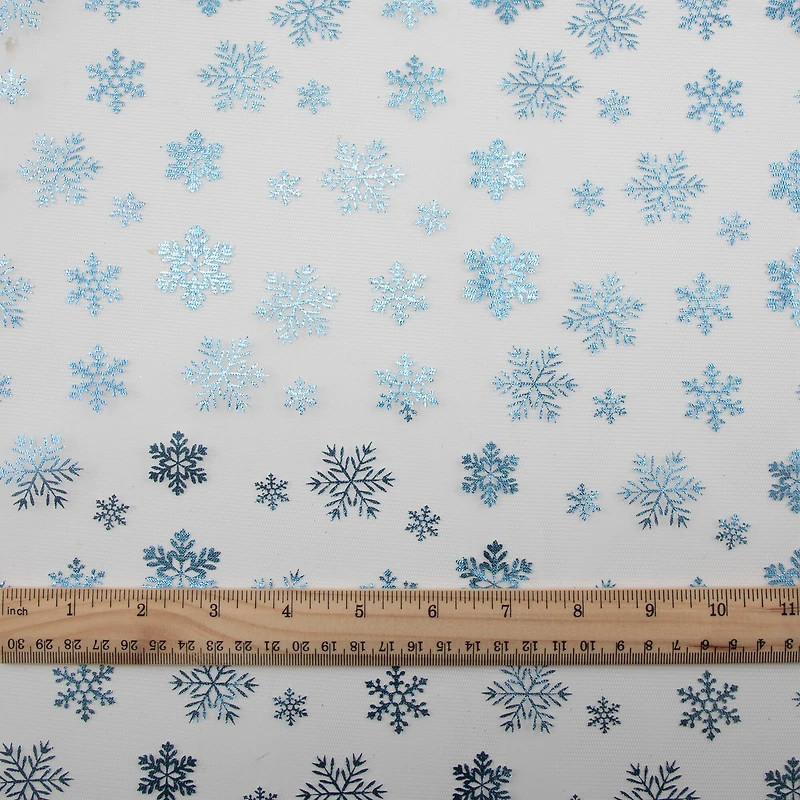 Wyla White Mesh with Blue Snowflakes Polyester Fabric