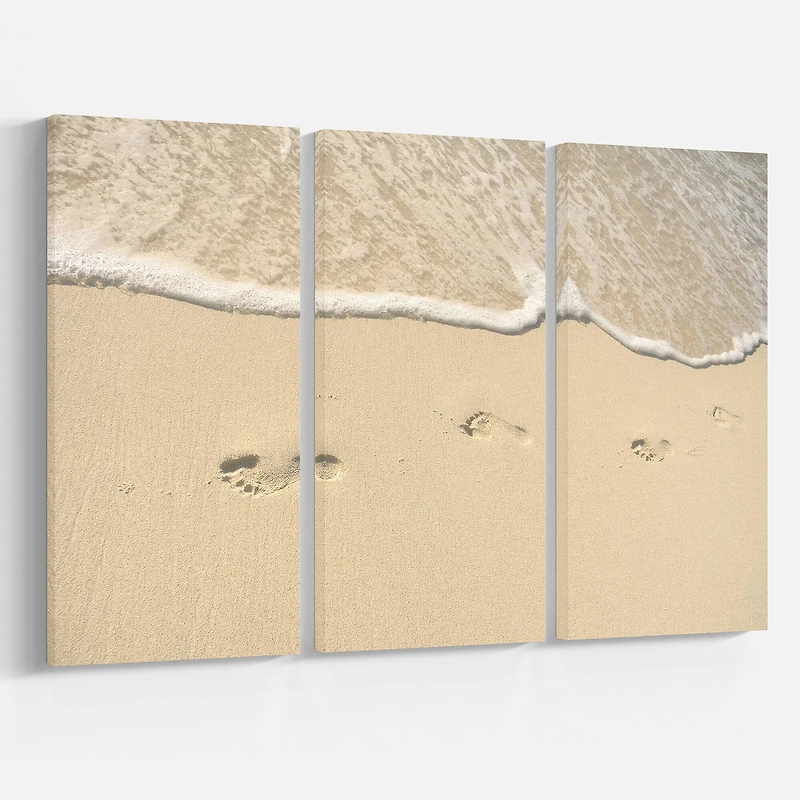 Designart - Footprints in Sand on the Beach