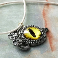 Found Objects Yellow Eye Pendant by Bead Landing™