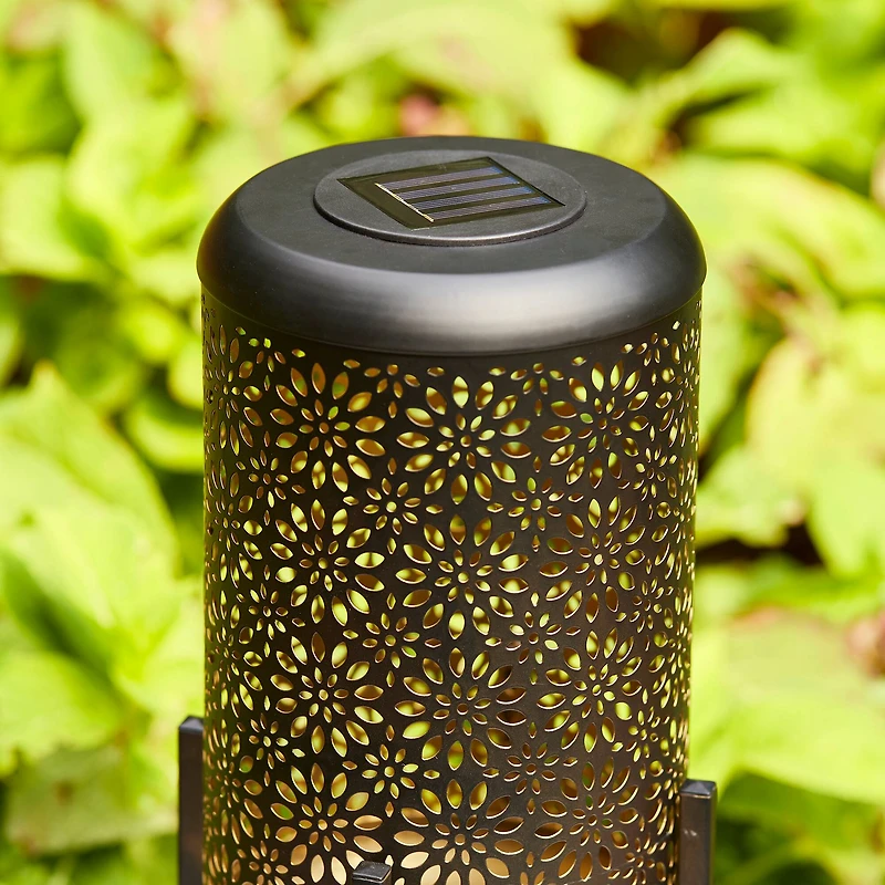 Glitzhome® 14.25" Black Metal Cutout Flower Pattern Solar Powered LED Outdoor Lanterns, 2ct.