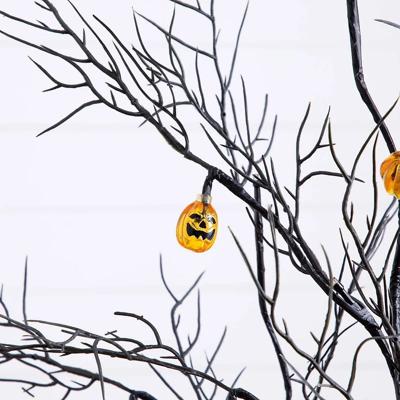 4ft. Pre-Lit Artificial Halloween Black Twig Tree with 24 Orange LED Pumpkin Shaped Lights