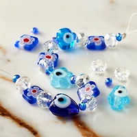 12 Pack: Blue Evil Eye Lampwork Glass Bead Mix by Bead Landing™