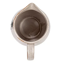 Hello Honey® 50oz. White & Black Reactive Glaze Flower Design Debossed Stoneware Pitcher