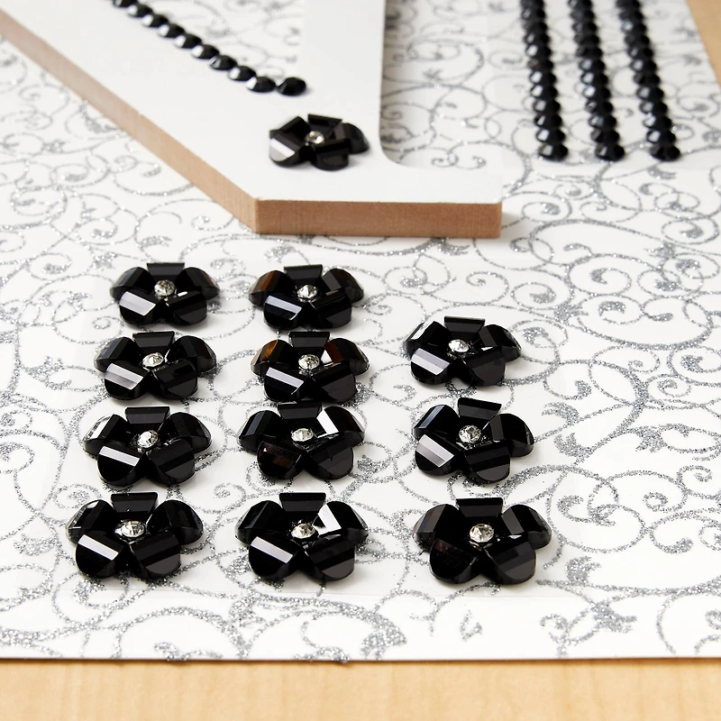 12 Packs: 12 ct. (144 total) Black Rhinestone Flowers by Recollections™
