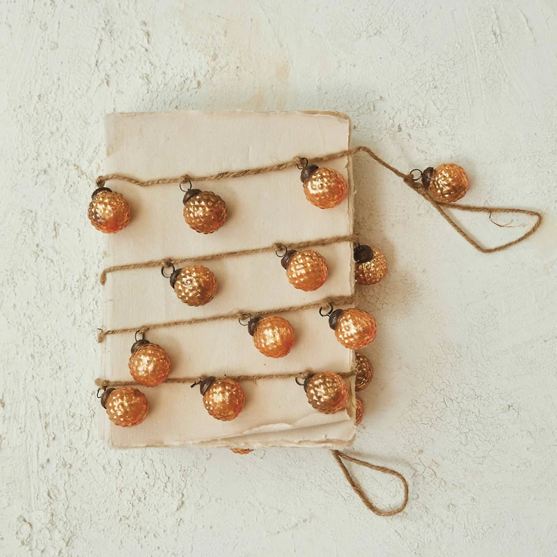 Hello Honey® 6ft. Apricot Embossed Mercury Glass Ball Ornament Garland on Jute String