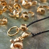 12 Packs: 150 ct. (1,800 total) 4mm Gold Clamshell Crimp Bead Covers by Bead Landing™