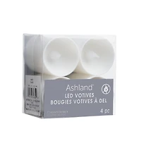White LED Votive Candles by Ashland®, 4ct.