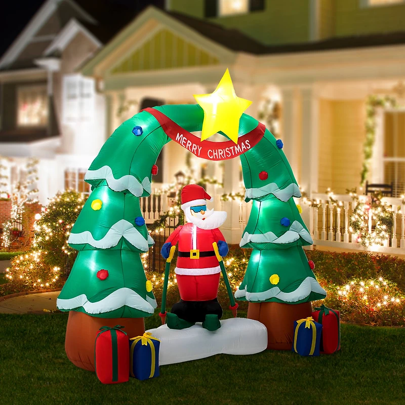 Glitzhome® 7ft. LED Lighted Inflatable Santa Skiing under Tree Arch Décor