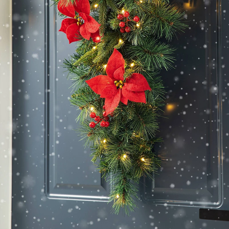 Glitzhome® 3ft. Pre-Lit Pine, Poinsettia & Berries Christmas Teardrop Swag