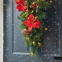 Glitzhome® 3ft. Pre-Lit Pine, Poinsettia & Berries Christmas Teardrop Swag