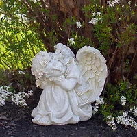 8.5" Ivory Resting Angel with Floral Crown Outdoor Garden Statue