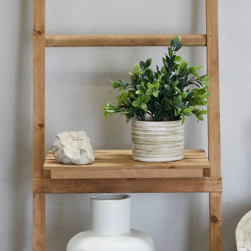 The Novogratz 11" Green Faux Foliage Eucalyptus Artificial Plant with Patterned Porcelain Pot