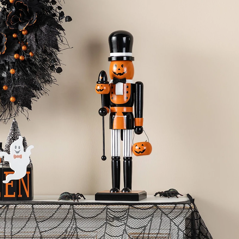 Glitzhome® 18.5"H Halloween Wooden Pumpkin Nutcracker with Ghost Ornament