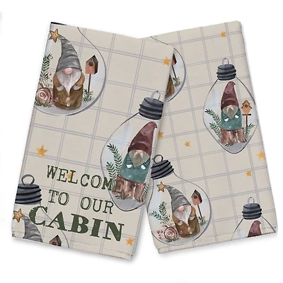 Welcome to our Cabin Cream and Check Gnome Globe Pattern Tea Towel