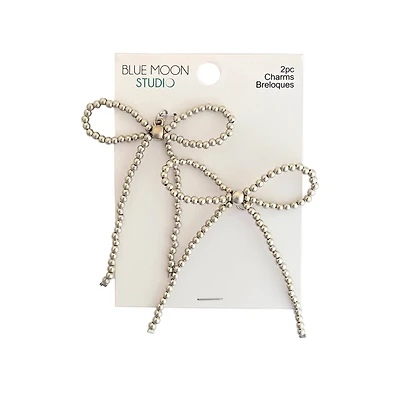 Blue Moon Studio™ Silver-Colored Beaded Bow Charms, 2ct.