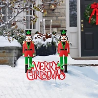 Glitzhome® Metal Nutcrackers & "MERRY CHRISTMAS" Yard Stake Set