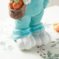 Glitzhome® 17.25" Easter Bunny Boy with Carrots Table Décor