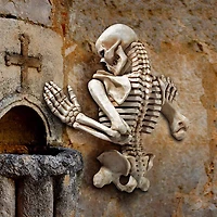 Design Toscano 21" Ascending Evil Climbing Skeleton Wall Sculpture