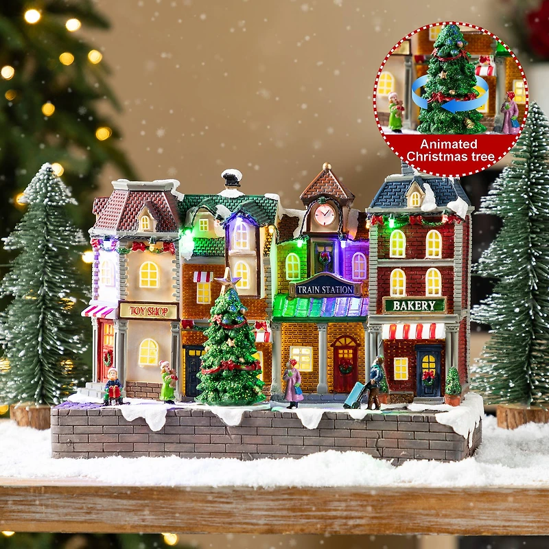 Glitzhome® 13.75" Lighted Christmas Train station Resin Village with Movement and Music