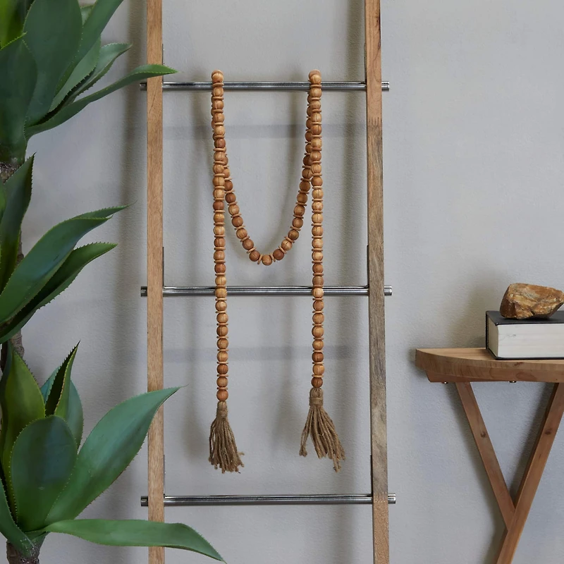 6.5ft. Brown Mango Wood Handmade Beaded Garland with Tassel