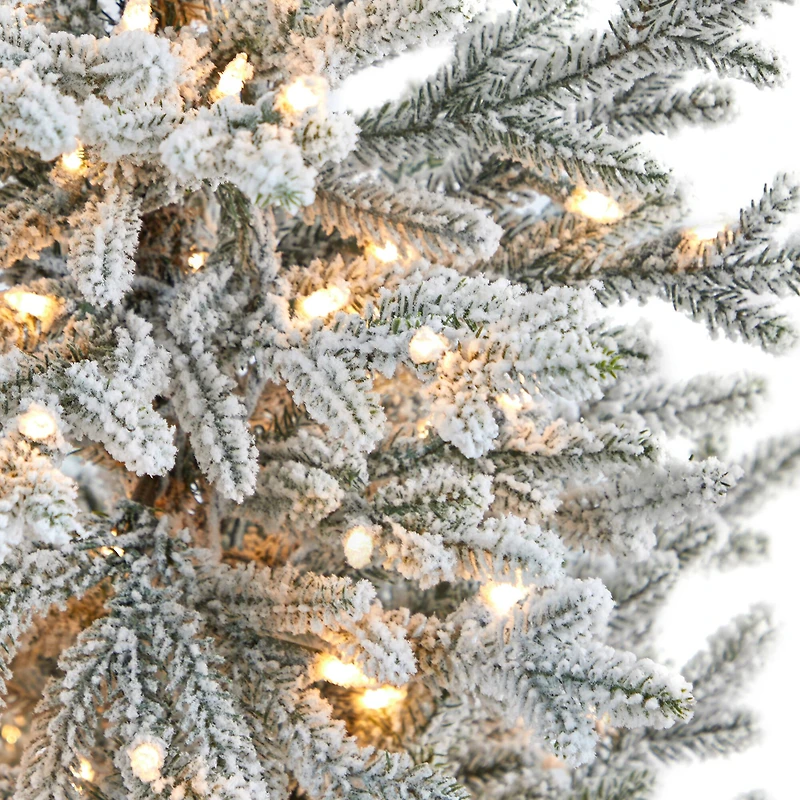 4.75ft. Pre-Lit Flocked Fraser Fir Artificial Christmas Tree  in Tower Planter, Warm White Lights