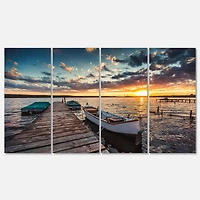 Designart - Boats and Jetty under Dramatic Sky