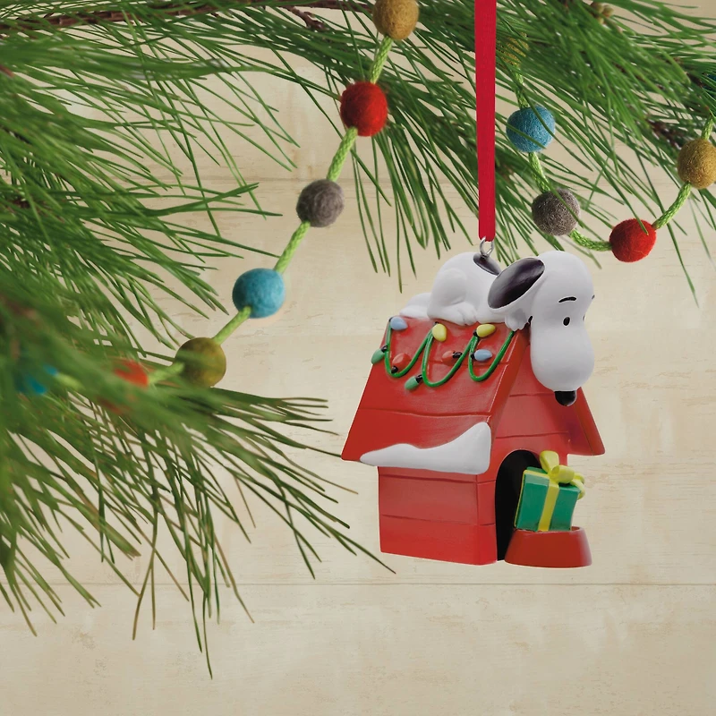 Hallmark Peanuts® 2.25" Snoopy on Holiday Doghouse Ornament