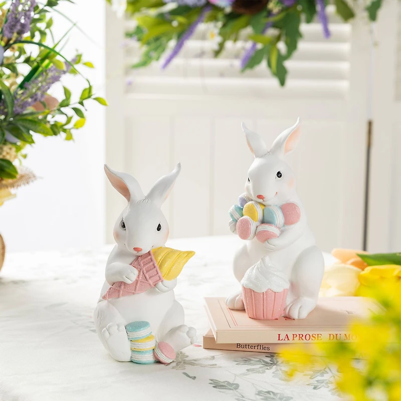 Glitzhome® Set of 2 Easter Resin Bunny Holding Macaron Table Decor