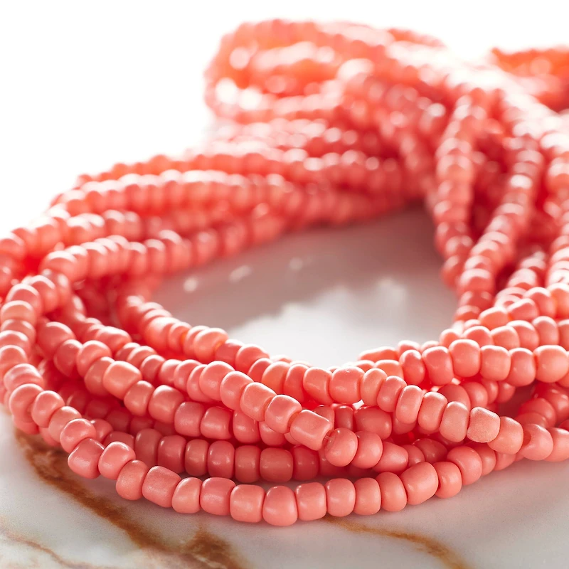 12 Pack: Coral Glass Medium Rondelle Seed Beads, 6/0 by Bead Landing™