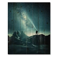 Designart - A Man Shining A Light Into The Night Sky
