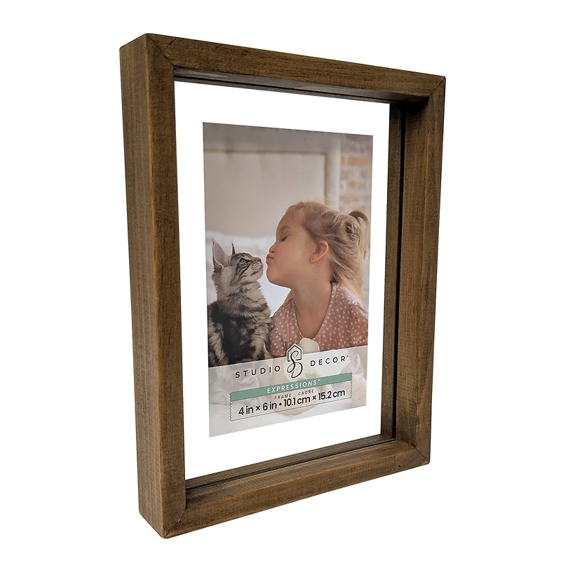 Expressions™ Brown Linear Wood Float Frame by Studio Décor