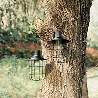 Glitzhome® 9.75" Black Metal Wire Solar Powered Hanging Lantern, 2ct.