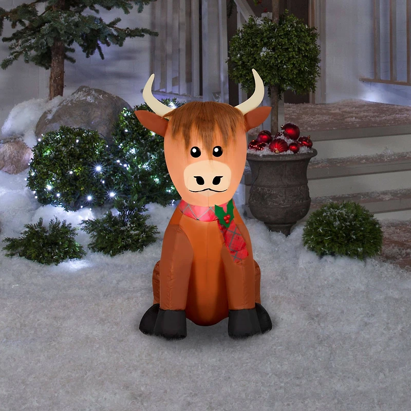 3.5ft. Airblown® Inflatable Christmas Highland Cow with Plush Accents