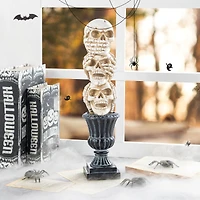 Glitzhome® 18"H Halloween Resin Stacked Skull Table Decor