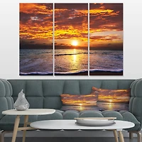 Designart - Yellow Sunset above Foaming Waves