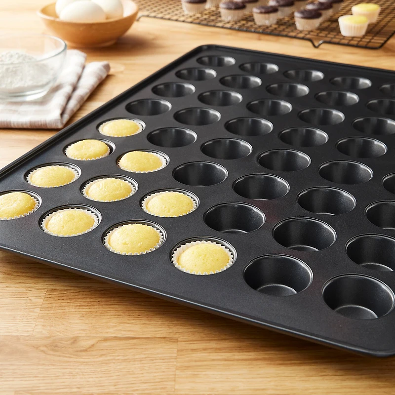 4 Pack: Non-Stick 48-Cavity Mini Muffin Pan by Celebrate It®