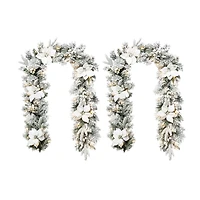 Glitzhome® 6ft. Pre-Lit Flocked Pine & White Poinsettia Christmas Garlands with Timers, 2ct.