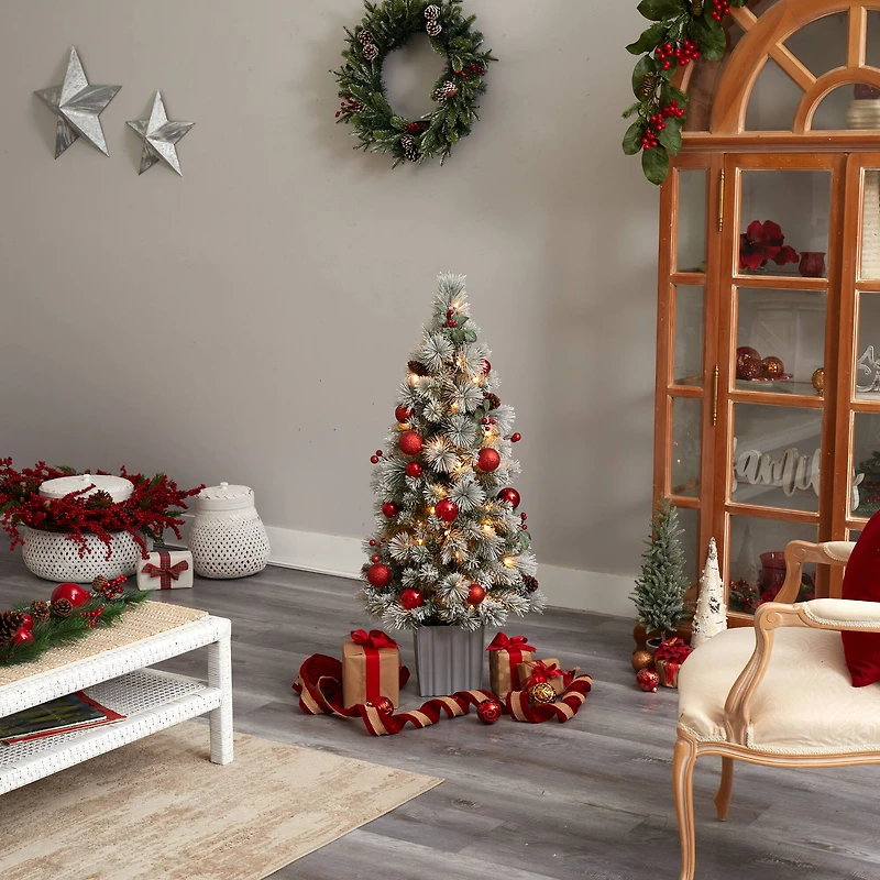 4ft. Pre-Lit Winter Flocked Artificial Christmas Tree in Decorative Planter, White LED Lights