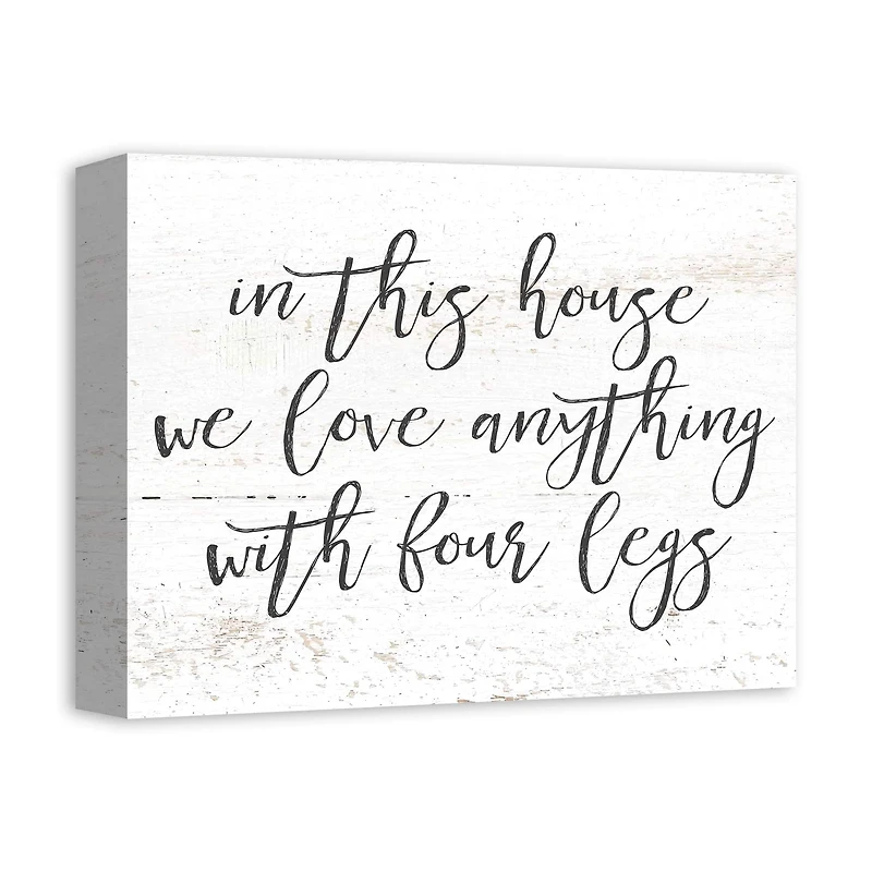 In This House We Love Anything with Four Legs Canvas Wall Art