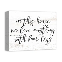 In This House We Love Anything with Four Legs Canvas Wall Art