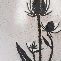 Hello Honey® 50oz. White & Black Reactive Glaze Flower Design Debossed Stoneware Pitcher