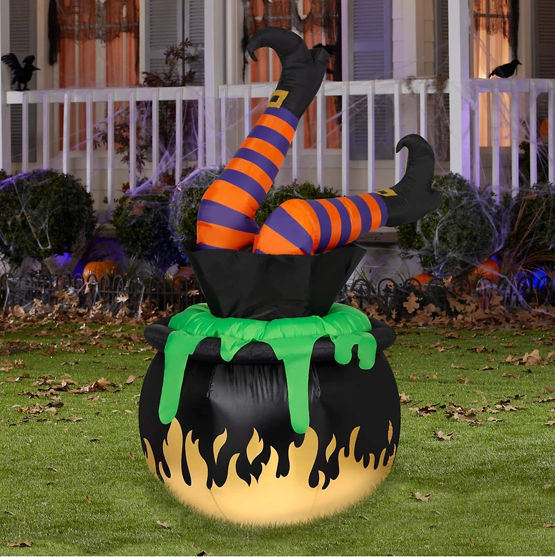 6ft. Airblown® Inflatable Animated Halloween Inflatable Kicking Witch Legs in Cauldron