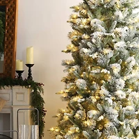 Glitzhome® 9ft Pre-Lit Flocked Slim Pine Artificial Christmas Tree, Warm White LED Lights