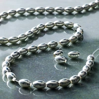 12 Pack:  Silver Metal Small Oval Beads, 6mm by Bead Landing™