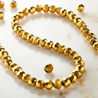 12 Pack: Gold Iris Glass Faceted Round Beads, 3mm by Bead Landing™