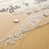 12 Packs: 3 ct. (36 total) Clear Flourish Adhesive Rhinestones by Recollections™